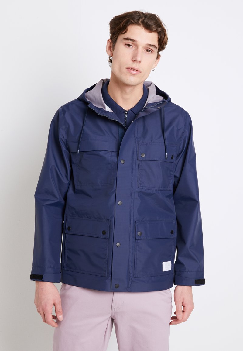 Sky T-Shirt Giacca Antipioggia con Cappuccio Blu Sky T-Shirt Giacca Antipioggia con Cappuccio Blu