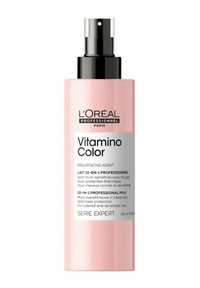 L'Oréal Professionnel Vitaminino Color bottle, 190 ml, pink plastic with a black pump. Features text in black and white, indicating hair treatment benefits.