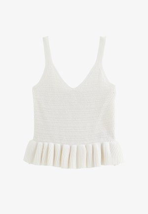 White knitted sleeveless top with V-neck and ruffled hem.