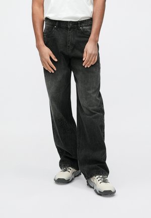 - Jeansy Relaxed Fit