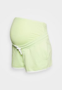 Calças curtas de maternidade verde-claro feitas de algodão macio. Apresentam um cós elástico com um cordão branco e uma bainha branca em contraste.