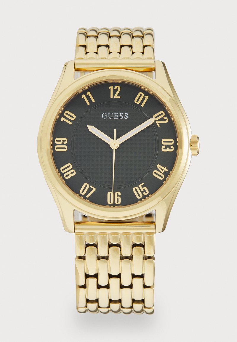 Gold-tone watch with a black textured dial, large golden hour markers, and matching hands. Features a linked metal bracelet strap.