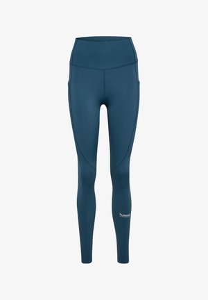 Niebieskie bezszwowe legginsy z wysokim stanem, bocznymi kieszeniami i małym logo "hummel" na dolnej lewej nodze.