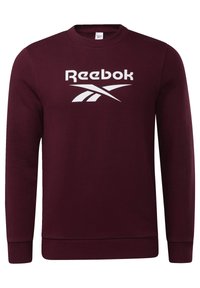 Sweat-shirt bordeaux à manches longues et col rond avec logo blanc Reebok centré sur la poitrine.