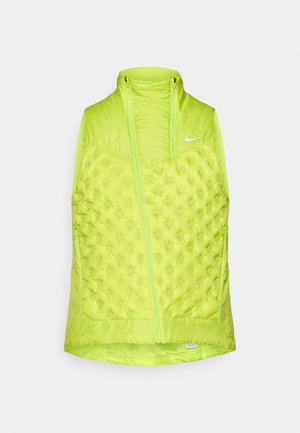 Λαχανί πρασινο αμάνικο μπουφάν με ψηλή γιακά, που διαθέτει υφαντό υφή, φερμουάρ μπροστά και μικρό λογότυπο στο πάνω αριστερό μέρος.