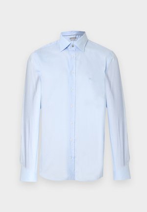 Camicia azzurro chiaro a maniche lunghe con bottoni, realizzata in tessuto strutturato. Presenta un colletto classico e un ricamo logo discreto sul petto.