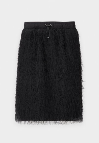Jupe noire en tissu duveteux avec une ceinture élastique et un cordon de serrage réglable. Texture douce, longueur genou et silhouette ample.