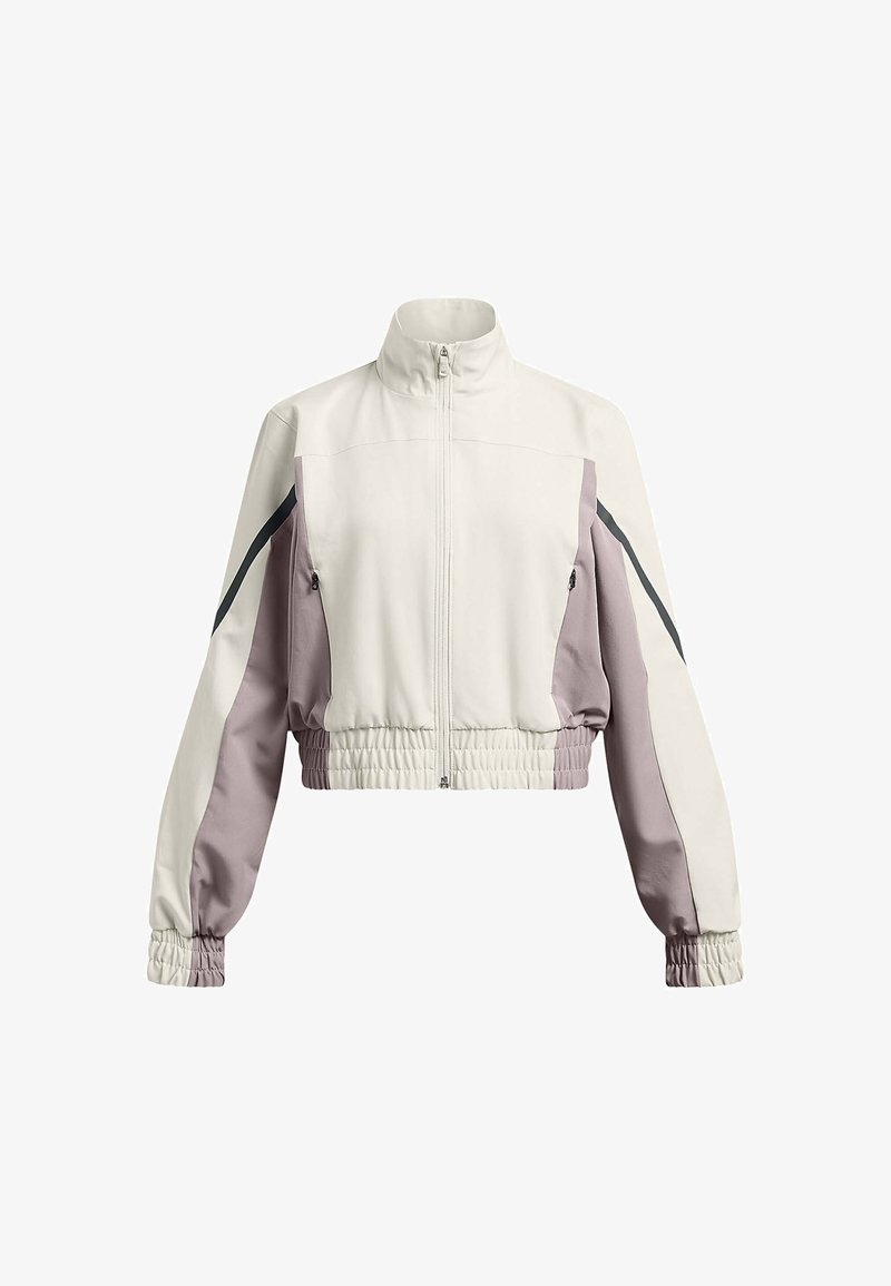 Geknipte zip-up jack in crème met lavendel en zwarte accenten. Heeft elastische manchetten en zoom, en twee zijzakken met rits.