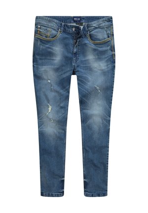 Jeans in denim blu con vestibilità slim. Tra le caratteristiche più rilevanti ci sono delle toppe strappate, scoloriture e cuciture gialle sulle tasche anteriori e sulla zip.