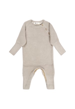 Beige gestrickter Baby-Overall mit langen Ärmeln und drei Holzknöpfen an einer Schulter, gerippten Bündchen und Fußöffnung.