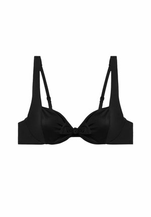 Black bra featuring a smooth fabric, wide straps, a bow detail at the center, and a structured design with underwire for support.