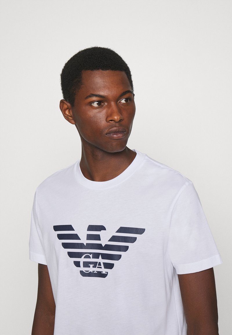 T-shirt maniche corte ,da uomo ,con fantasia floreale