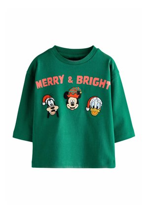 T-shirt in cotone verde con vestibilità oversize, colletto rotondo e personaggi Disney ricamati con cappelli festivi, etichettato "MERRY & BRIGHT."