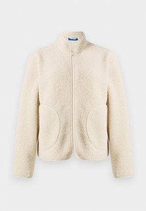 Krém színű plüss dzseki elülső cipzárral, két kerek elülső zsebbel és rövid álló gallérral.