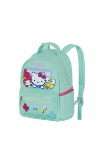 Sac à dos Hello Kitty bleu clair avec les personnages Hello Kitty, My Melody et Keroppi, doté d'une poche avant et de bretelles réglables.