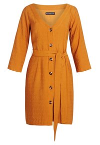 Orange linnekjol med figursydd midja, v-hals, långa ärmar och fyra dekorativa knappar framtill. Inkluderar ett matchande bälte.