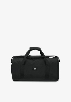 Borsa duffel nera Vans con doppie maniglie e una piccola toppa con logo frontale, mostrata su sfondo bianco.