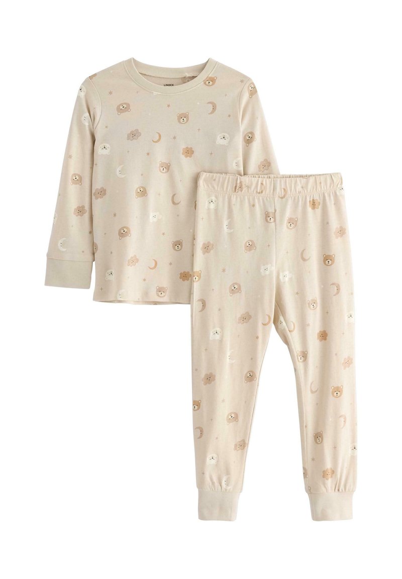 Ensemble de pyjama beige clair comprenant un haut à manches longues et un pantalon, orné de motifs animaliers et célestes dans des couleurs pastel douces.