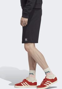 adidas Originals ESSENTIALS MADE - Tracksuit bottoms - black