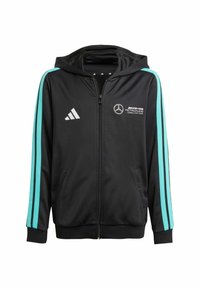 Felpa nera con zip e strisce laterali turchesi, con logo Adidas e branding Mercedes AMG Petronas. Realizzata in tessuto liscio.