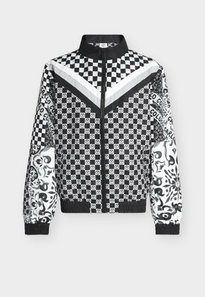 Schwarz-weiß gemusterte Reißverschlussjacke mit Schachbrett-, Blumen- und Textdesigns, elastischen Bündchen und hohem Kragen.