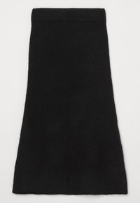 Jupe noire longueur genou avec une légère évasée, en tissu doux et duveteux, présentée à plat sur fond blanc.