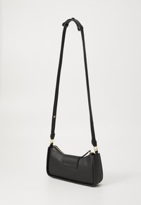 Black leather crossbody bag with a structured shape, adjustable strap, and gold-tone hardware. Features a smooth texture and a zip closure.