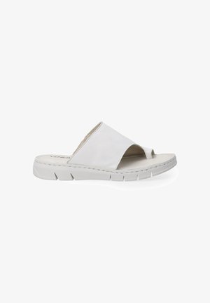 Weisse Leder-Sandalen mit offenem Zehenbereich, ausgestattet mit einer dicken Gummisohle mit Rillen und einem Überkreuzriemen zur Unterstützung.
