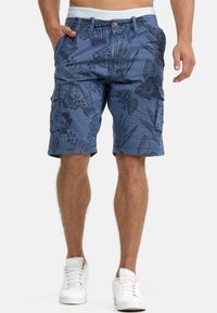 Blue cargo shorts feature a floral pattern, side pockets, and a drawstring waistband. Made from breathable fabric for comfort.