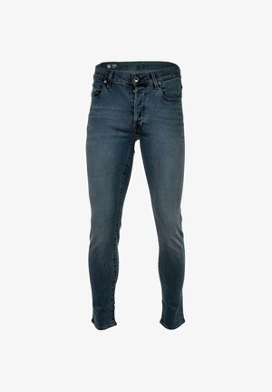 Schmale Jeans aus dunkelblauem Denim. Merkmale sind ein Knopfverschluss, Gürtelschlaufen und dezente Ausbleichungen. Knöchellängiger Schnitt mit glatter Textur.