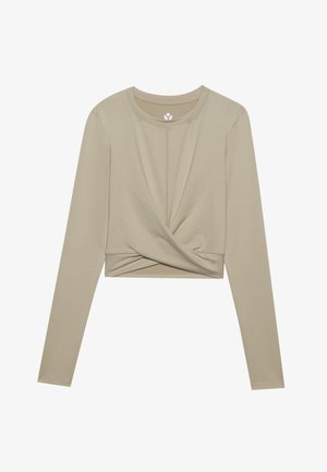 Šviesiai bežinis ilgų rankovių trumpas viršus su sukurtu priekiu, pagamintas iš lygaus audinio. Turi apvalų iškirpimą ir priglundančias rankoves.