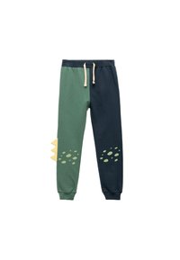 Grüne und marineblaue Jogginghose mit einem Kordelzugbund, versehen mit einem gelben Schuppendetail und kreisförmigen Mustern im Kniebereich. Weicher Stoff.