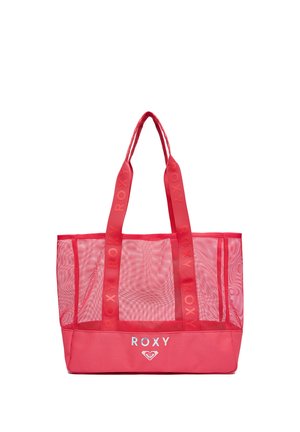 Rød net-tote taske med solid bund og håndtag, med "ROXY" branding på stropper og front, mod en hvid baggrund.
