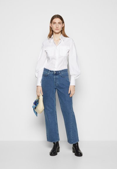 Won Hundred BAGGY - Calças de ganga de corte relaxado - medium scrape blue