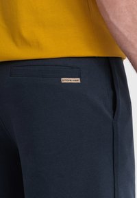 Ombre Teplákové kalhoty - navy