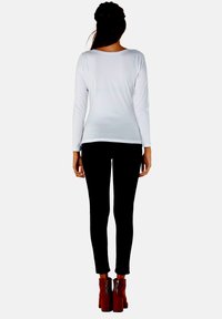 M.M.C. BABY FLUCHT - Langarmshirt - weiß