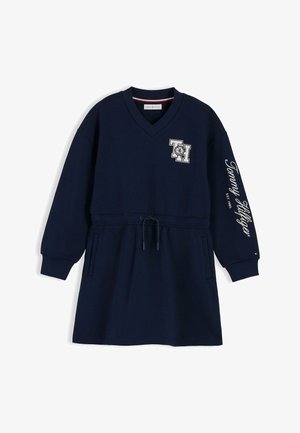 Mørkeblå langærmet afslappet kjole med V-hals, forlommer, taljetræk, TH-patch på brystet og "Tommy Hilfiger" skrift på ærmet.