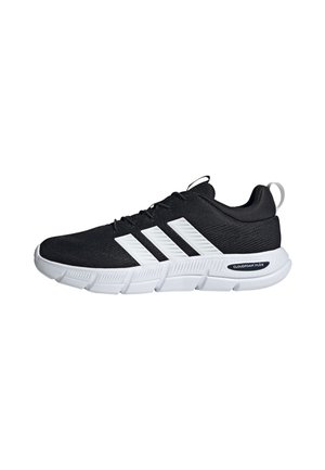 Chaussure de sport noire avec une semelle blanche et trois bandes blanches sur le côté, dotée d’un amorti Cloudfoam Flex et d’une languette arrière.