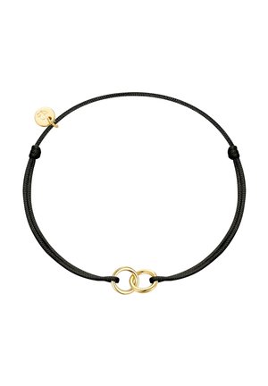 Black adjustable cord bracelet with two small interlocking gold rings and a small gold charm.