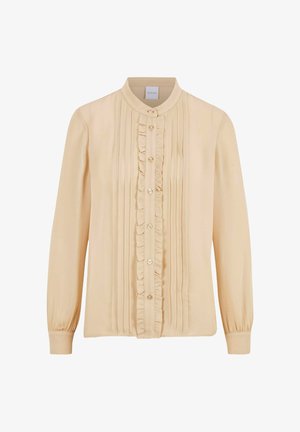 Beige blouse with a stand collar, front ruffle detail, and button closure. Long sleeves with gathered cuffs. Smooth, lightweight fabric.