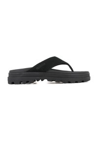 Black flip-flop made of rubber with a textured strap and patterned sole featuring durable treads for traction. Brand name visible on strap.