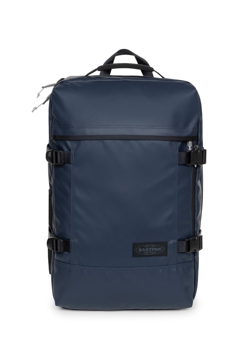 Sac à dos bleu marine fabriqué en matériau synthétique durable, doté d'une poche avant, de bretelles réglables et d'une poignée supérieure.