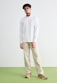 Puma VELOPHASIS EARTH UNISEX - Tossud - prairie tan/chamomile
