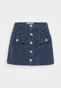 Marineblå tweed mini skjørt med frontknapplukking, to påsydde lommer og teksturert mønster. Har sølvfargede knapper for festing.