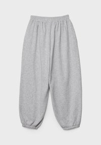 Graue Jogginghosen aus weichem Stoff, mit einem elastischen Bund und gerippten Bündchen, in locker sitzender Silhouette.