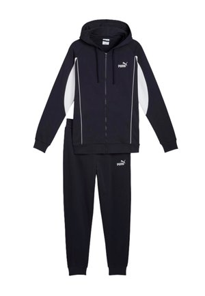 Tuta Puma nera con giacca con cappuccio con zip e pannelli laterali bianchi e pantaloni jogger abbinati, entrambi con logo Puma.