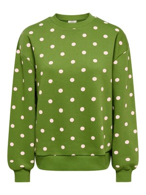 Green pullover sweatshirt with a crew neck, featuring pink polka dots. It has long sleeves and ribbed cuffs and hem. Soft fabric texture.