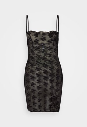 Black lace dress with thin straps, floral pattern, fitted silhouette, scalloped edges, and sheer texture, featuring additional lace accents.