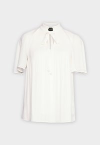 Vit kortärmad blus med hög hals, med en knytning framtill och subtila plisseringar för textur och designdetalj.