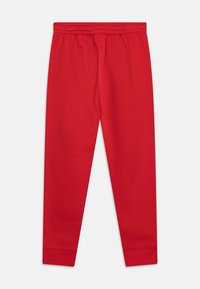 Outerstuff NBA TEAMS DISNEY JOGGERS UNISEX - Klupska odjeća - university red